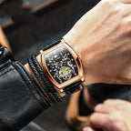 Orologio da polso da uomo con tourbillon scheletrato resistente agli urti con movimento meccanico automatico e cinturino in vera pelle