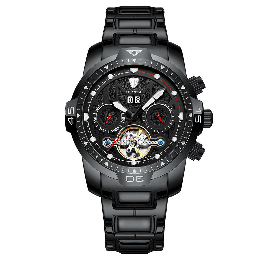 A silver mechanical watch with a patterned dial, stainless steel band, and a spiral crown.