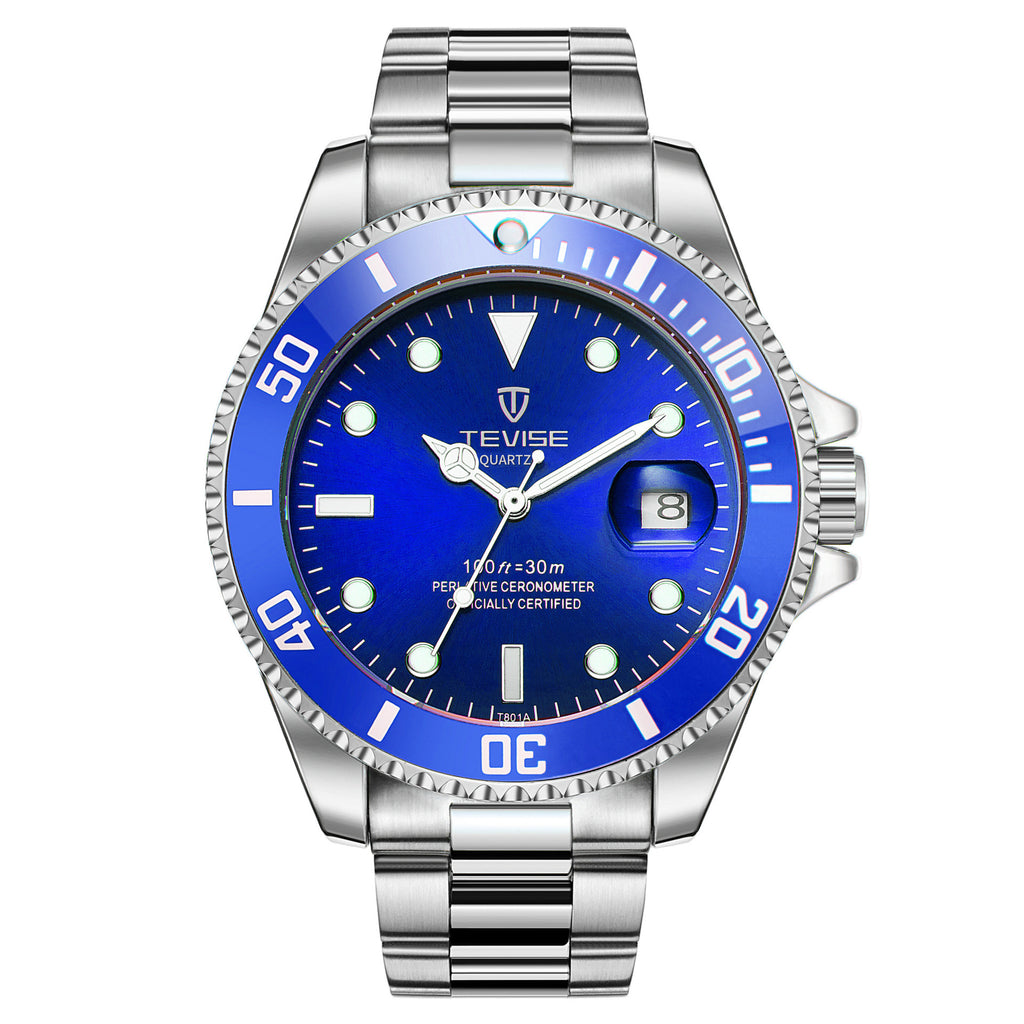 A silver stainless steel men's quartz watch with a green dial and luminous hands, a date display, and a stainless steel bracelet.