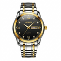 Two-tone silver and gold watch with black dial on a white background