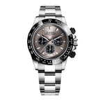 A men's quartz watch with a silver stainless steel band and a blue dial, featuring luminous hands and a calendar display.