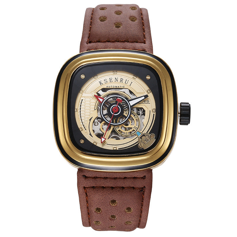 A black and rose gold mechanical watch with a perforated leather strap and a skeleton dial.