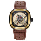 A black and rose gold mechanical watch with a perforated leather strap and a skeleton dial.