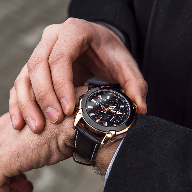 Person wearing a smartwatch with a close-up of the watch face.