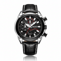 Black wristwatch with detailed face and leather strap on a white background