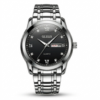 Silver watch with black dial on a white background