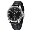 A blue mechanical watch with a round dial, stainless steel case, pin buckle, and a blue leather strap.