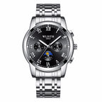 A silver stainless steel watch with a green dial, Roman numerals, and a pin buckle.