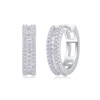 A pair of silver diamond earrings with a woven pattern and inlaid with small round diamonds.