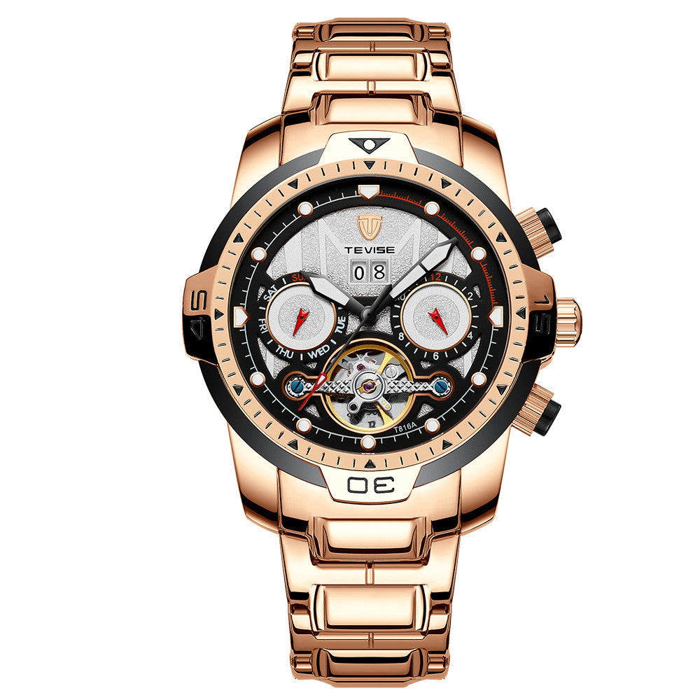A silver mechanical watch with a patterned dial, stainless steel band, and a spiral crown.