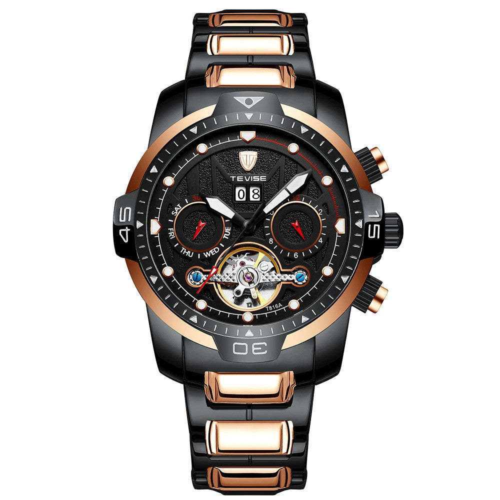 A silver mechanical watch with a patterned dial, stainless steel band, and a spiral crown.