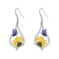 Modieuze oorbellen voor dames, gemaakt van S925 sterling zilver, met een zonnebloemmotief en een hangertje.