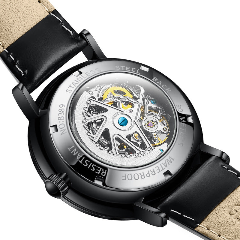 Orologio da uomo automatico TRSOYE di lusso alla moda con cinturino in pelle nera traforata, autentico e leggero