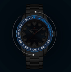 Black wristwatch with blue accents on a dark background