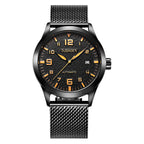 A stainless steel mechanical watch with a green dial and a metallic mesh band. The watch has a date display and is labeled with 'CUBAEX' on the dial.