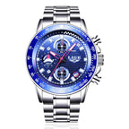 Silver watch with a blue face on a white background