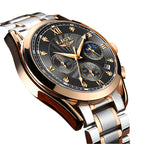 Luxury watch with detailed face and rose gold and silver band on wooden surface