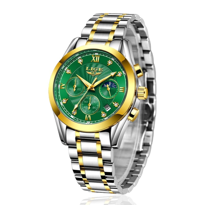 Luxury watch with green dial and gold accents on a white background