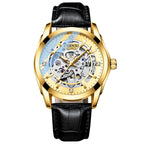 A gold-colored automatic mechanical watch with a black leather strap, featuring a hollow and luminous dial.