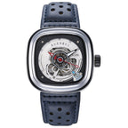 A black and rose gold mechanical watch with a perforated leather strap and a skeleton dial.