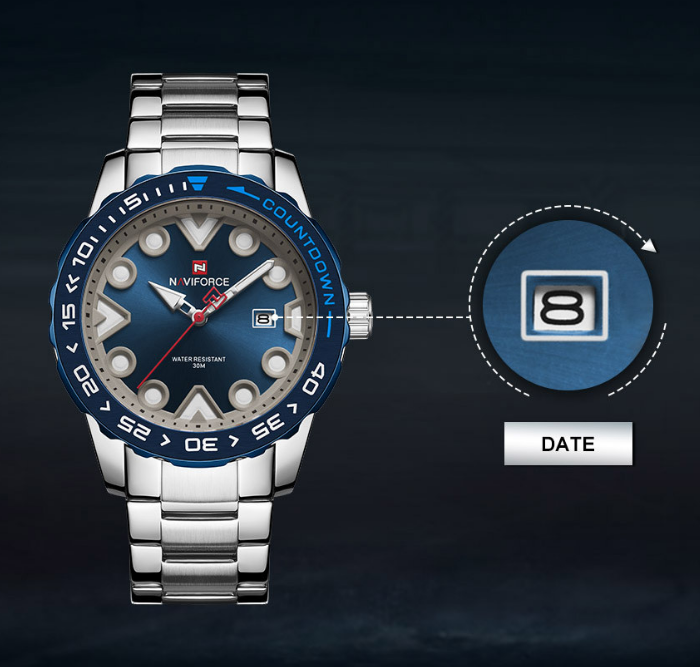 Silver watch with blue dial on a dark background