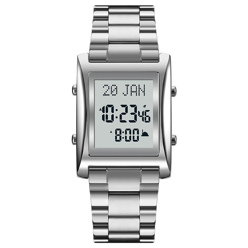 A digital watch with a black band and black case, displaying a digital screen with time and date.