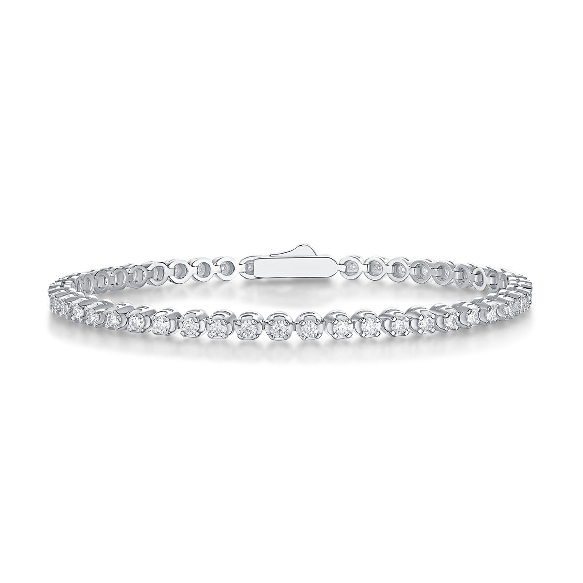 A tennis bracelet featuring silver color and adorned with diamonds.